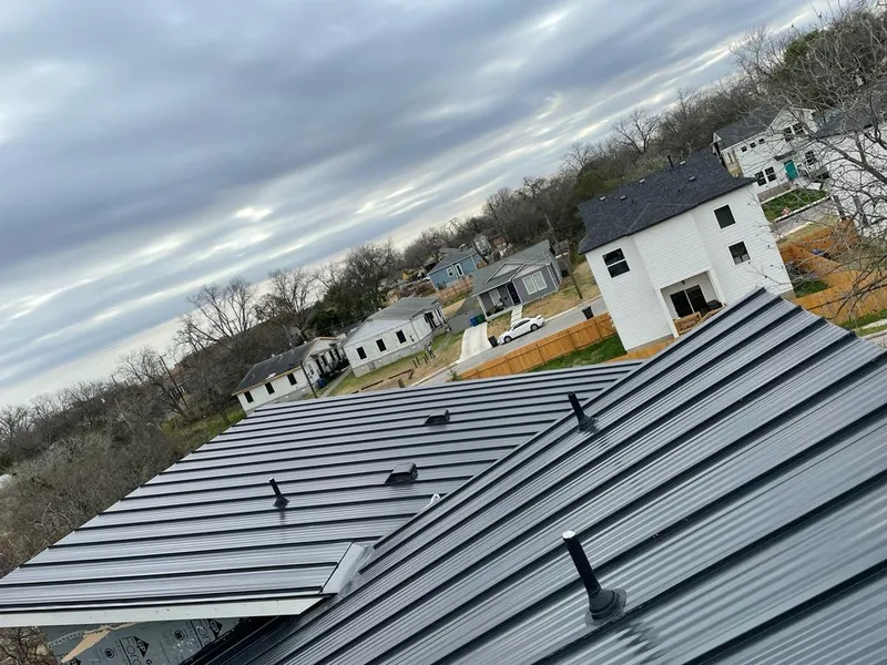Standing seam metal roof panels with vents for Skylight Repair in Londonderry